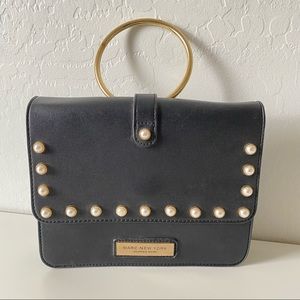 Black faux leather purse with gold & pearl detail